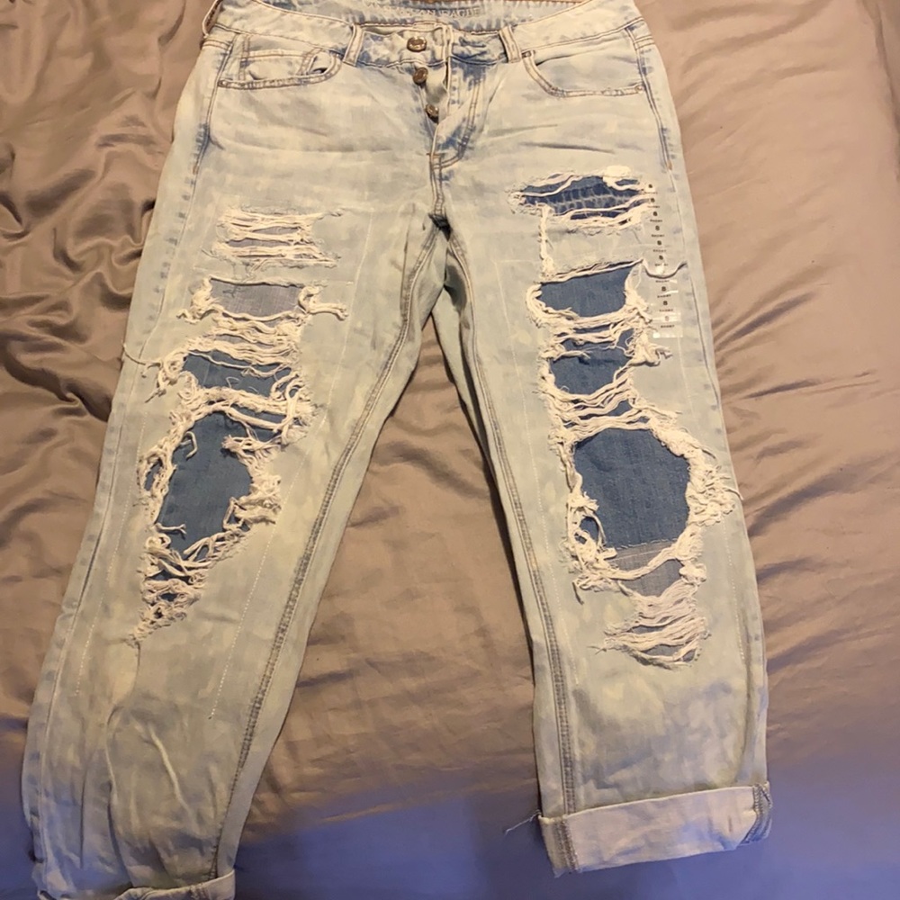 Light blue distressed jeans
